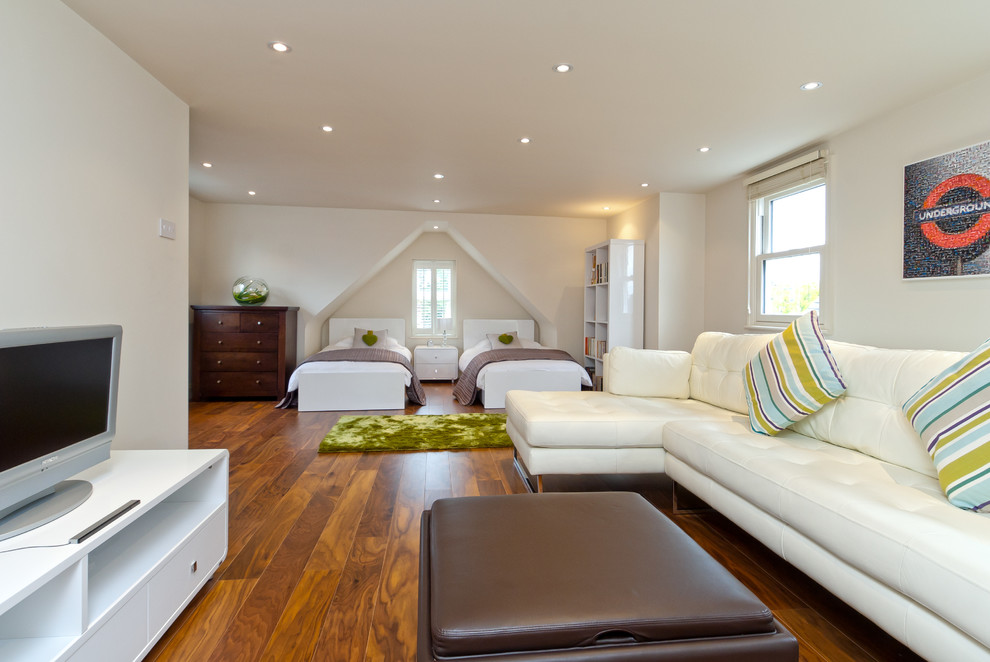 Photo of a contemporary bedroom in Surrey.