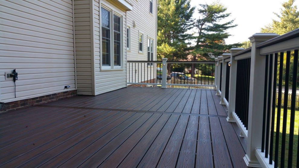 Inspiration for a large backyard deck remodel