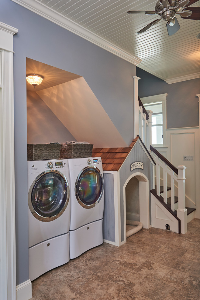 Photo of a mid-sized contemporary galley dedicated laundry room in Other with an undermount sink, recessed-panel cabinets, white cabinets, quartzite benchtops, grey walls, ceramic floors and a side-by-side washer and dryer.