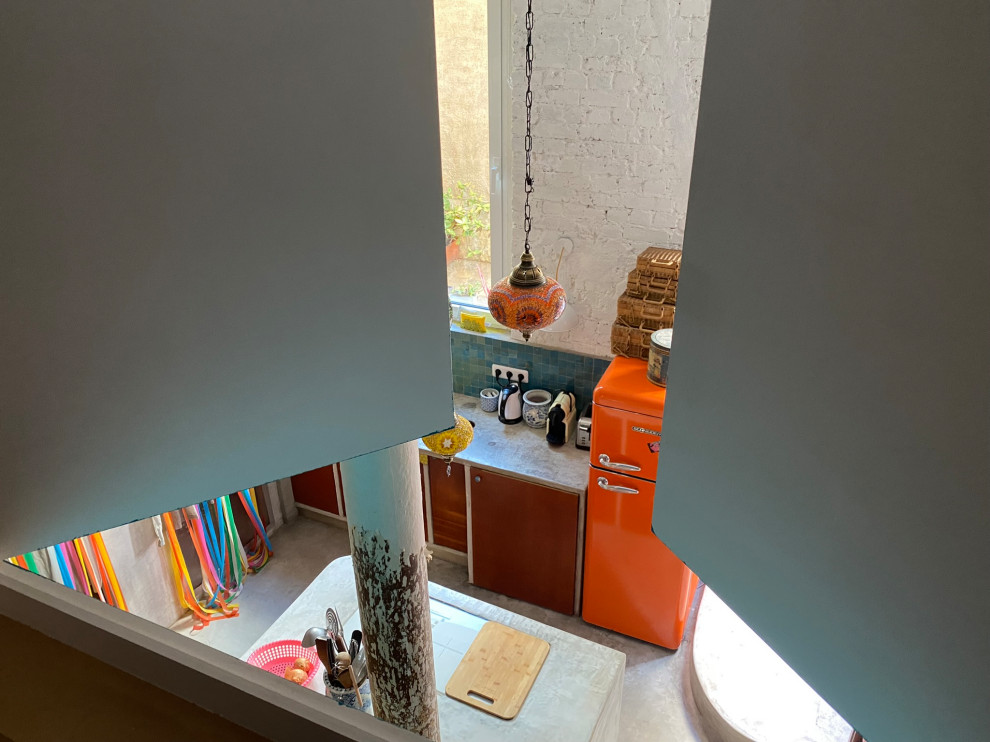 Transformation d'un local en loft brutaliste tropical