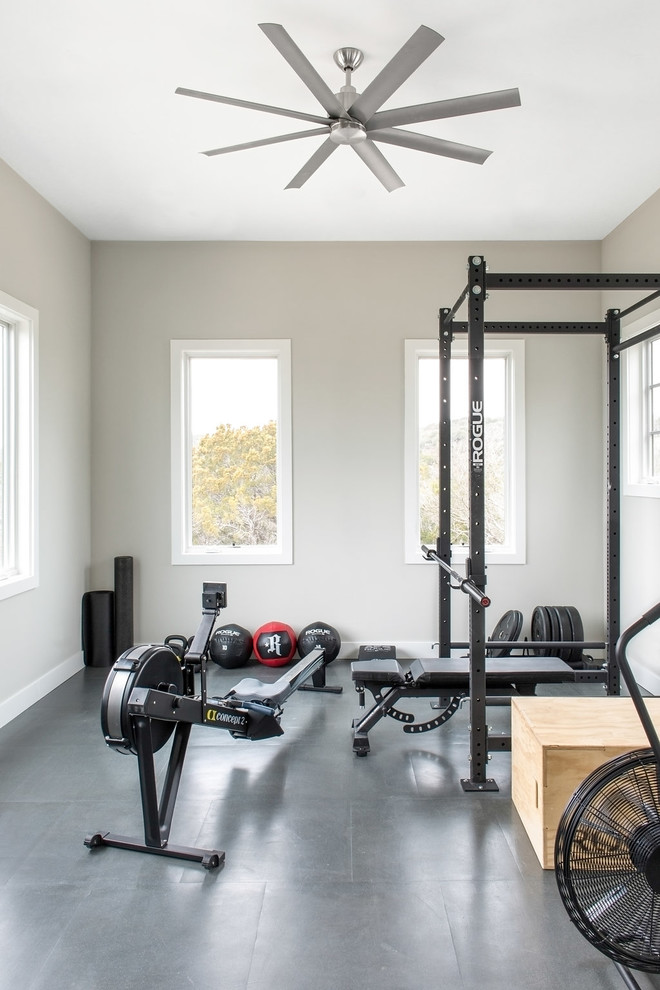 Contemporary multipurpose gym in Austin with beige walls and grey floor.