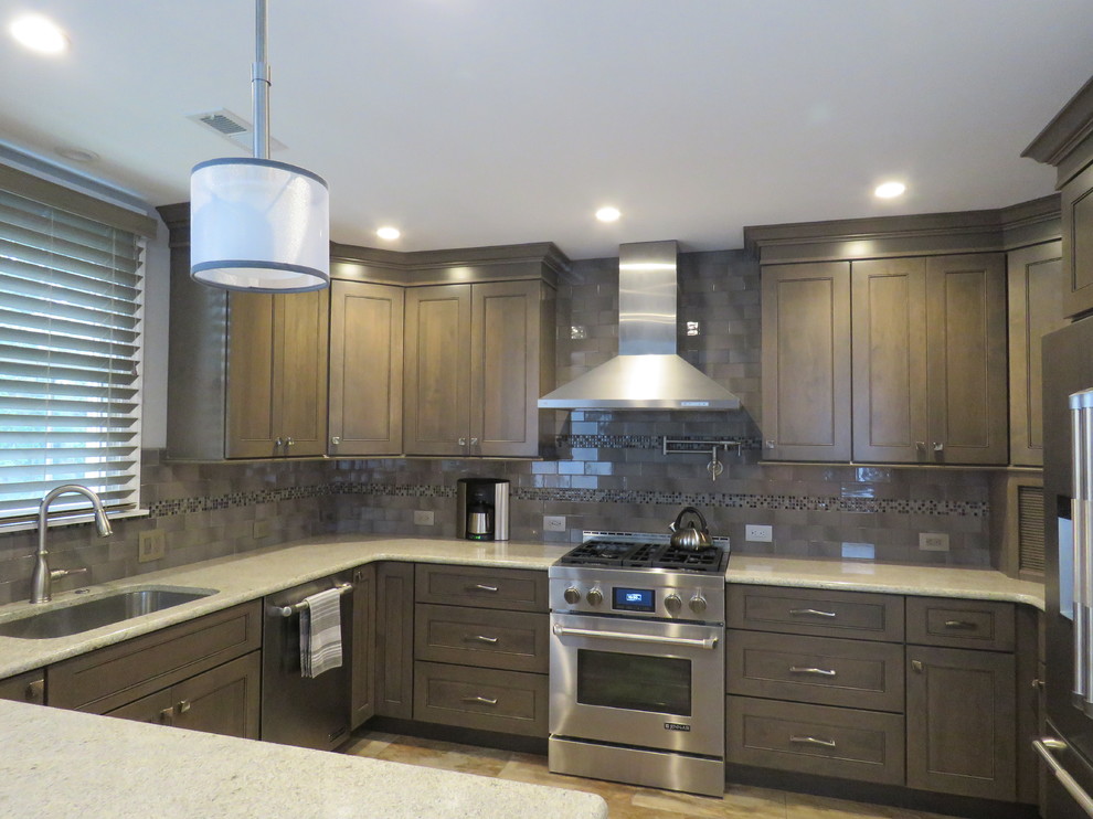 Eat-in kitchen - mid-sized transitional u-shaped ceramic tile and beige floor eat-in kitchen idea in Philadelphia with an undermount sink, shaker cabinets, gray cabinets, quartzite countertops, gray backsplash, subway tile backsplash, stainless steel appliances and an island