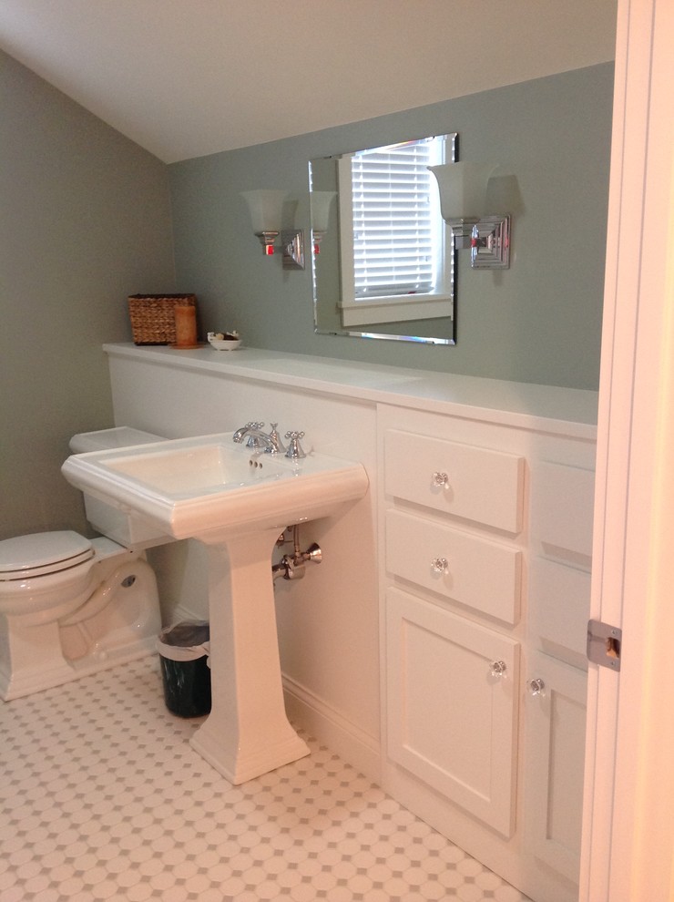 This is an example of an arts and crafts bathroom in Other with a pedestal sink, white cabinets, wood benchtops, an alcove tub, a two-piece toilet, white tile and mosaic tile.
