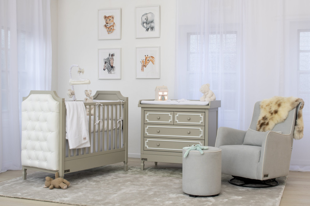 Inspiration for a contemporary gender-neutral nursery in London with white walls.