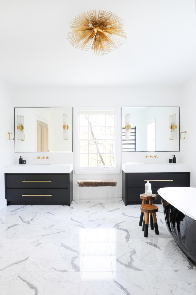 Design ideas for an eclectic bathroom in Vancouver with a freestanding tub, black and white tile, porcelain tile, marble floors, an undermount sink, white floor, flat-panel cabinets, black cabinets, white walls and white benchtops.