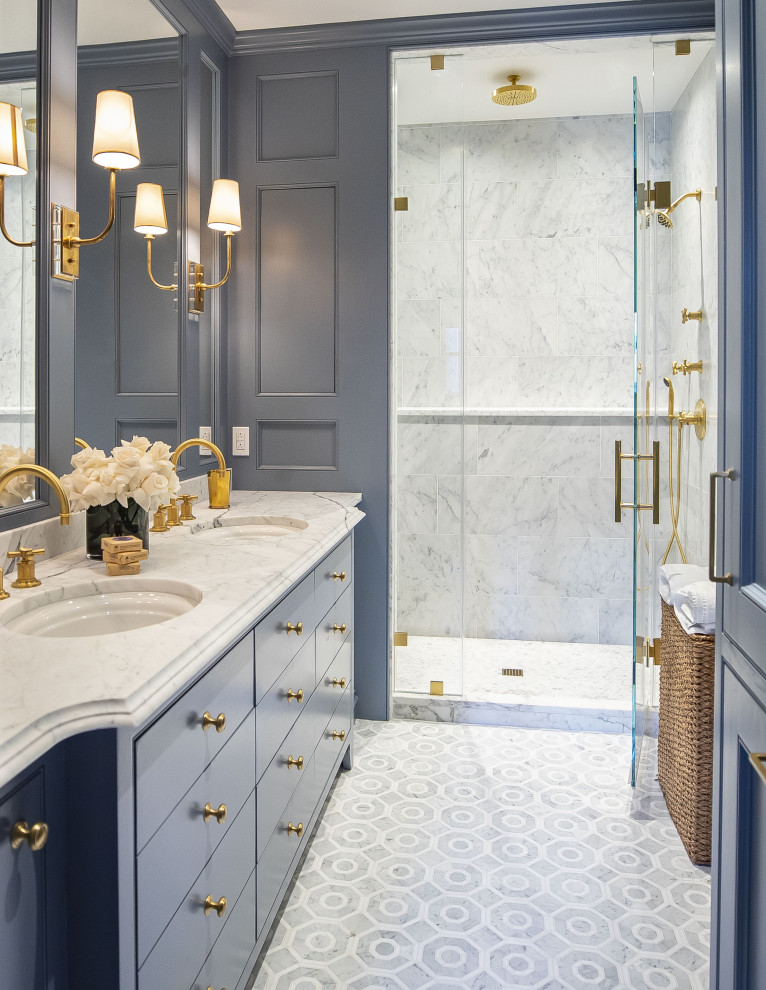 Design ideas for a large transitional master bathroom in Philadelphia with blue cabinets, an alcove shower, grey walls, porcelain floors, an undermount sink, grey floor, a hinged shower door, white benchtops and beaded inset cabinets.
