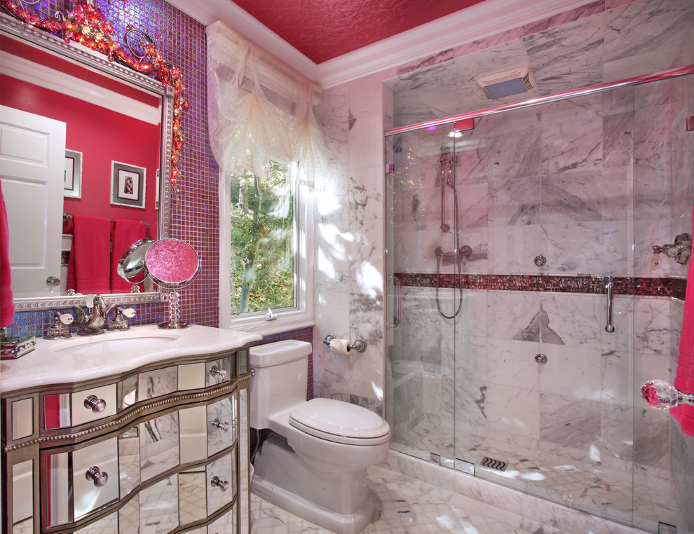 Photo of an eclectic bathroom in Orange County with flat-panel cabinets.