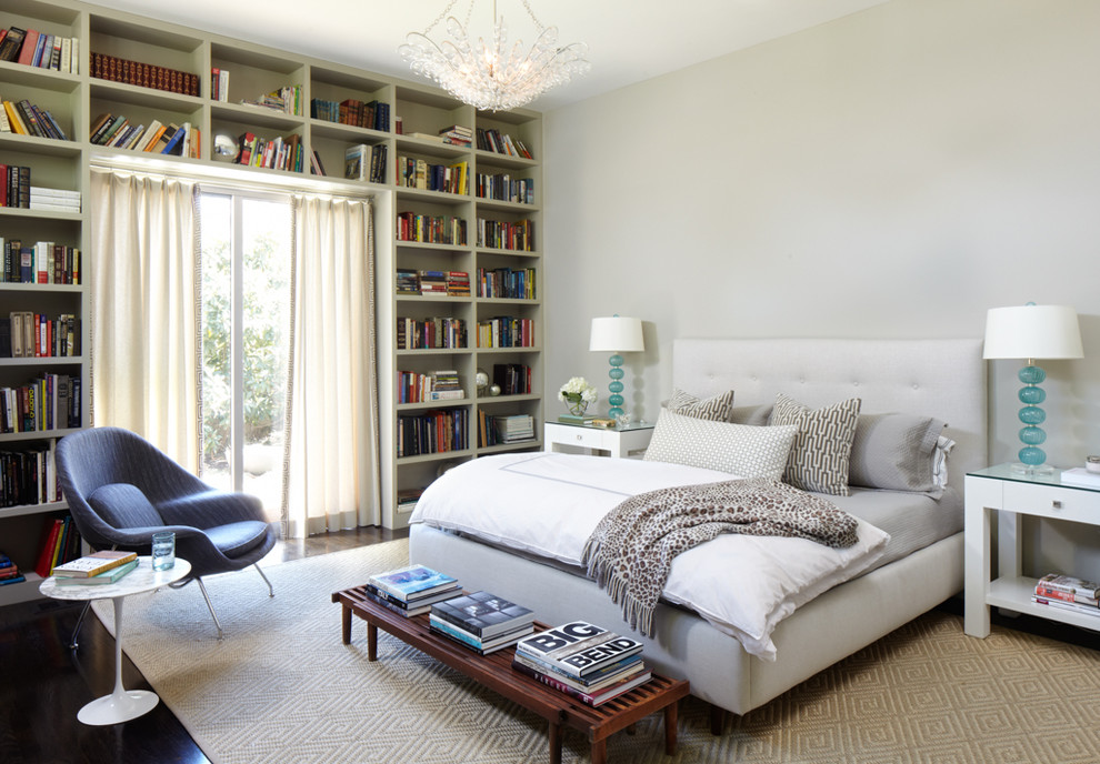 Transitional bedroom in Austin with white walls, dark hardwood floors and brown floor.