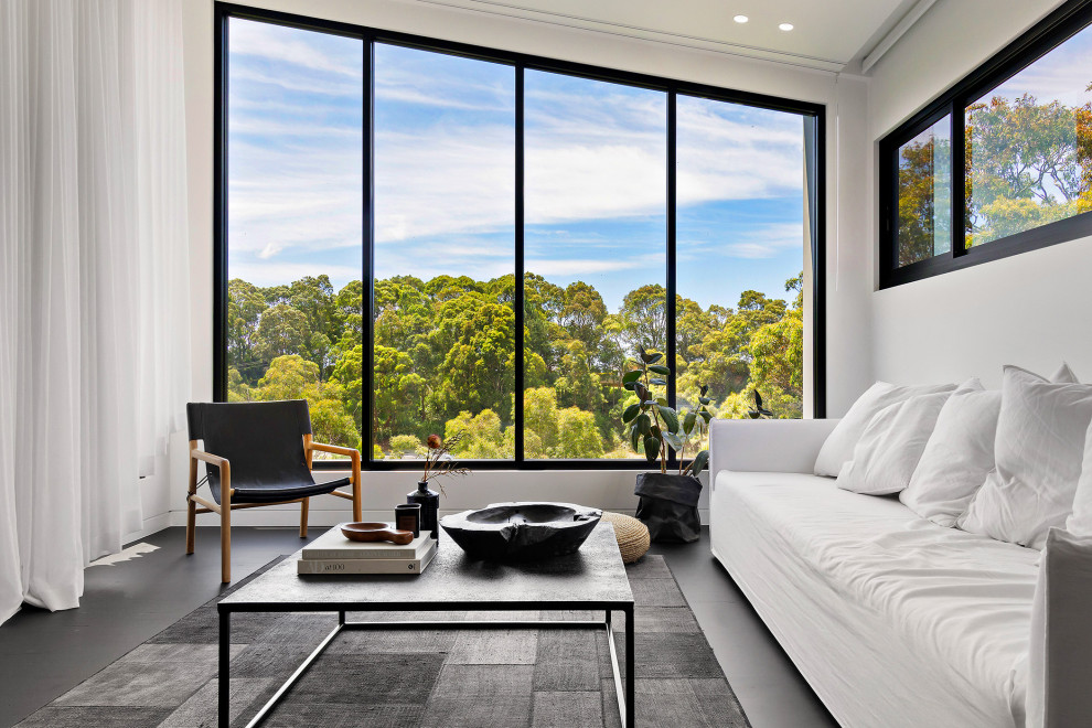 This is an example of a contemporary family room in Newcastle - Maitland.