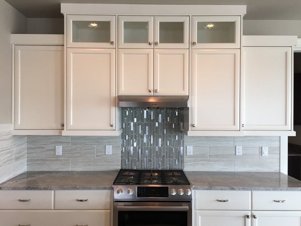 Example of a transitional kitchen design in Boise