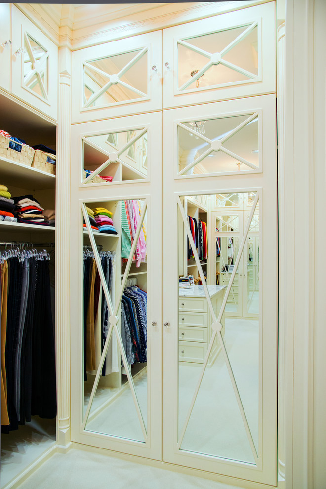 Design ideas for a transitional storage and wardrobe in Charlotte.