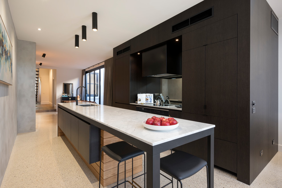 Design ideas for a contemporary galley eat-in kitchen in Melbourne with an undermount sink, flat-panel cabinets, dark wood cabinets, grey splashback, panelled appliances, with island and beige floor.