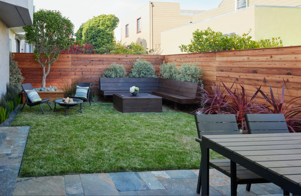Design ideas for a mid-sized modern backyard patio in San Francisco with a fire feature, tile and no cover.