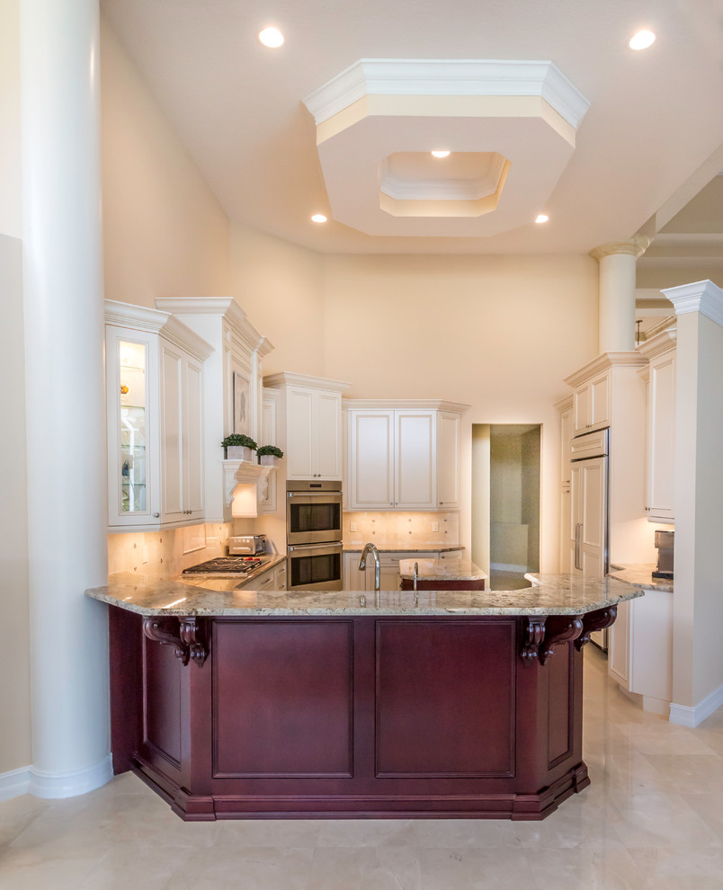 Kitchen - large transitional u-shaped marble floor kitchen idea in Miami with a single-bowl sink, shaker cabinets, white cabinets, granite countertops, stainless steel appliances and an island