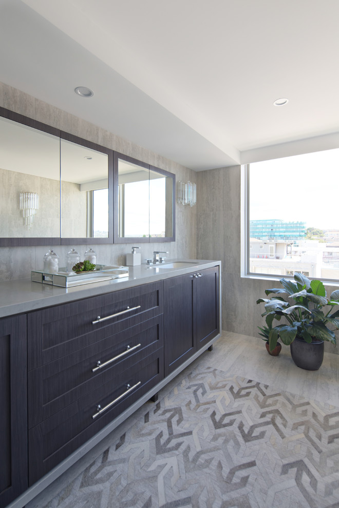 Large contemporary master bathroom in Sydney with shaker cabinets, medium wood cabinets, an undermount tub, a double shower, a bidet, gray tile, travertine, grey walls, travertine floors, an undermount sink, engineered quartz benchtops, grey floor and a sliding shower screen.