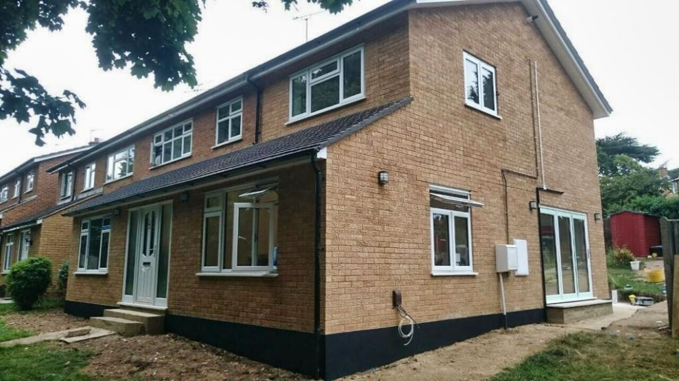 front, side and rear double storey extensions