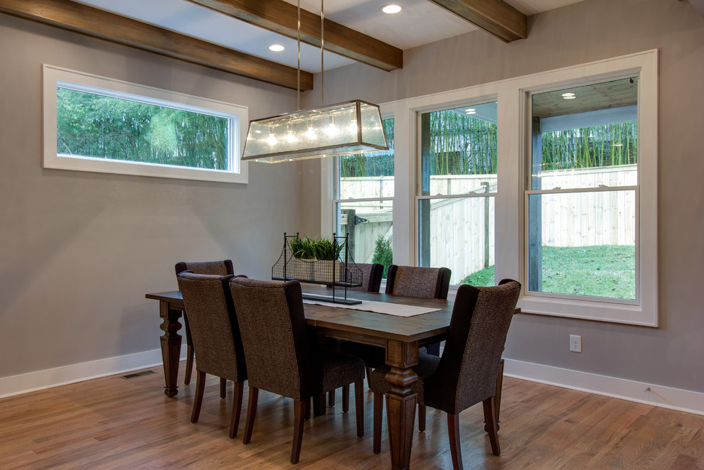 Inspiration for a mid-sized arts and crafts separate dining room in Nashville with grey walls, light hardwood floors, no fireplace and multi-coloured floor.