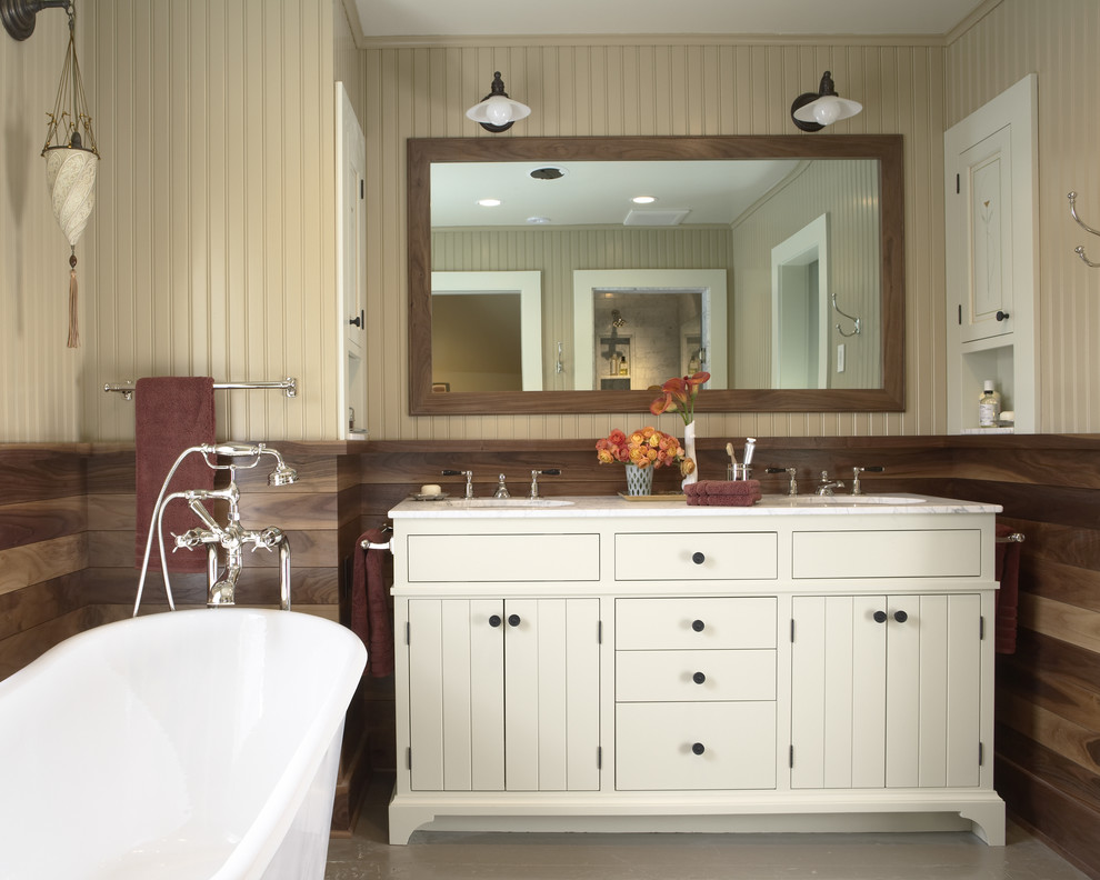 Design ideas for a traditional bathroom in Minneapolis with a freestanding tub.