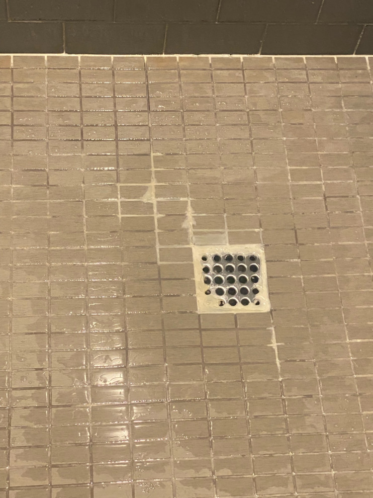 Grout around drain