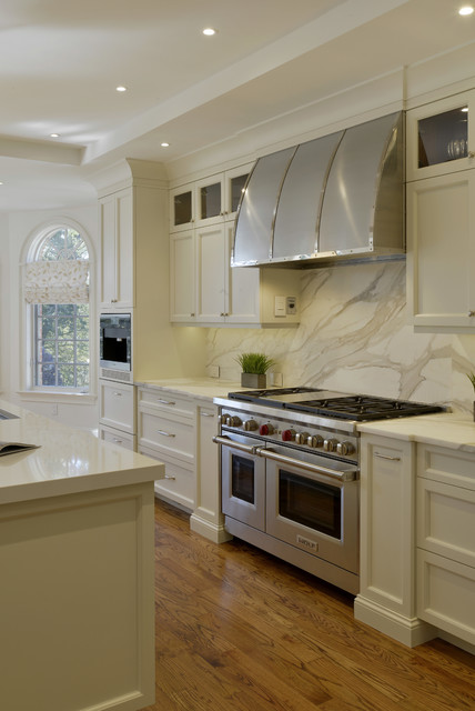 A Dramatic Marble Backsplash in a Transitional Kitchen nyklassisk-koekken
