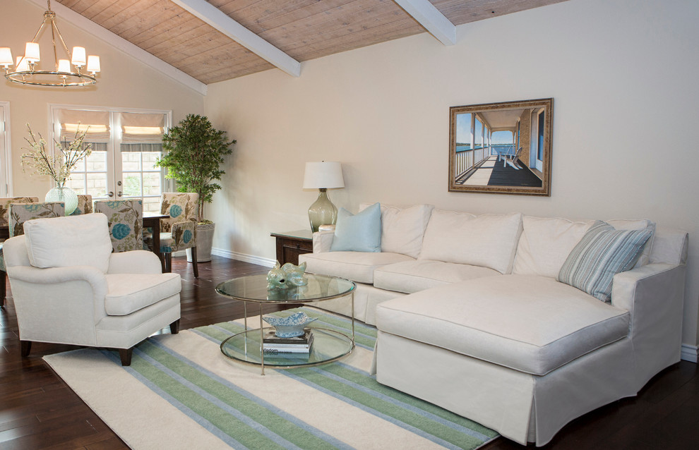 Inspiration for a mid-sized transitional dark wood floor living room remodel in Los Angeles with white walls and a two-sided fireplace
