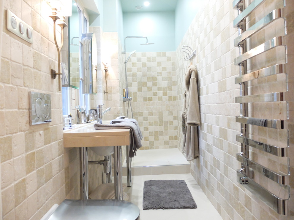 Design ideas for a mid-sized transitional 3/4 bathroom in Other with an open shower, beige tile, travertine, ceramic floors, a console sink, marble benchtops, beige floor, beige cabinets, beige walls, an open shower, beige benchtops and beaded inset cabinets.