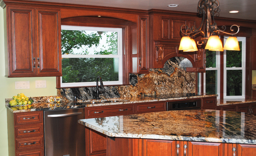 Enclosed kitchen - mid-sized l-shaped medium tone wood floor enclosed kitchen idea with a double-bowl sink, raised-panel cabinets, dark wood cabinets, granite countertops, brown backsplash, stone slab backsplash, stainless steel appliances and an island