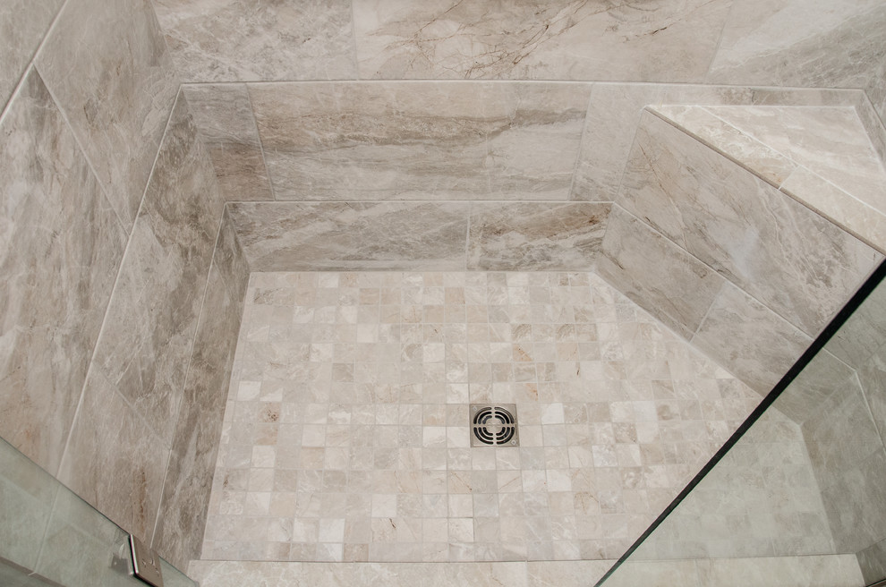 Inspiration for a mid-sized transitional master bathroom in Detroit with recessed-panel cabinets, brown cabinets, an alcove tub, an alcove shower, green walls, porcelain floors, an undermount sink, granite benchtops, grey floor, a hinged shower door and brown benchtops.
