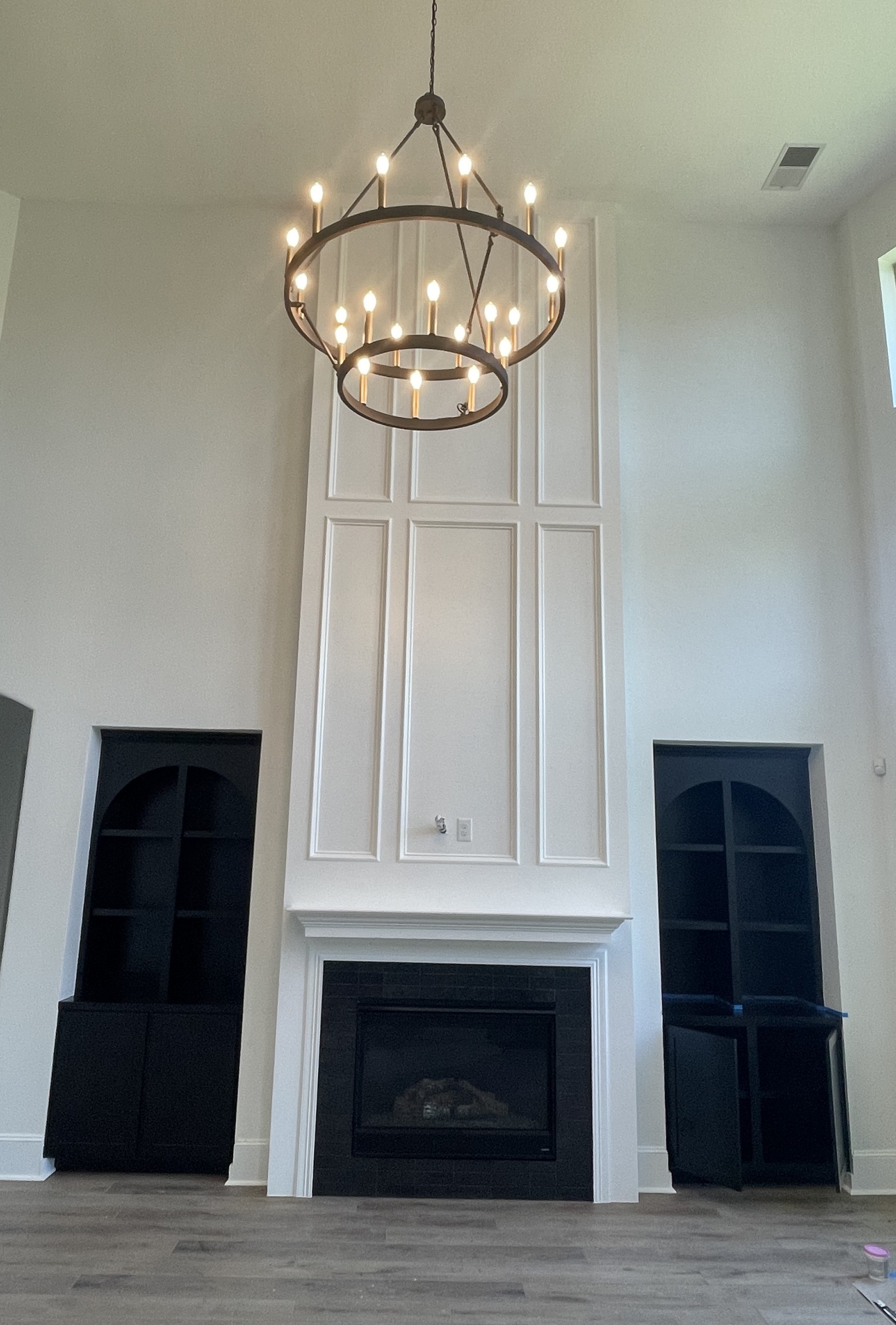 Fireplace with Wood Paneling Fireplace and Custom Built-in Cabinets in Cypress,
