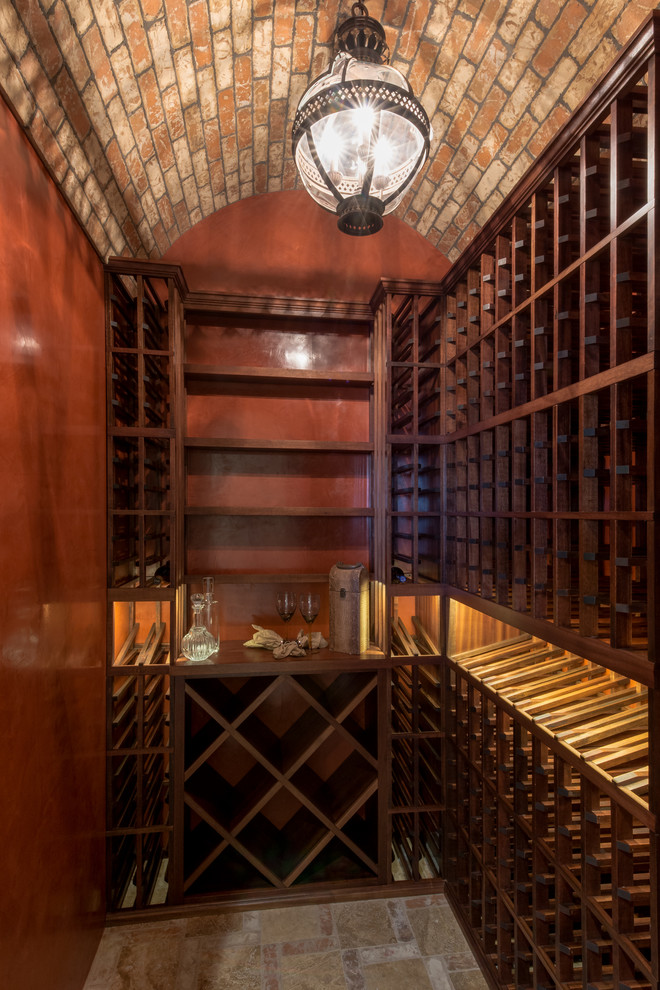 This is an example of a small mediterranean wine cellar in San Diego.
