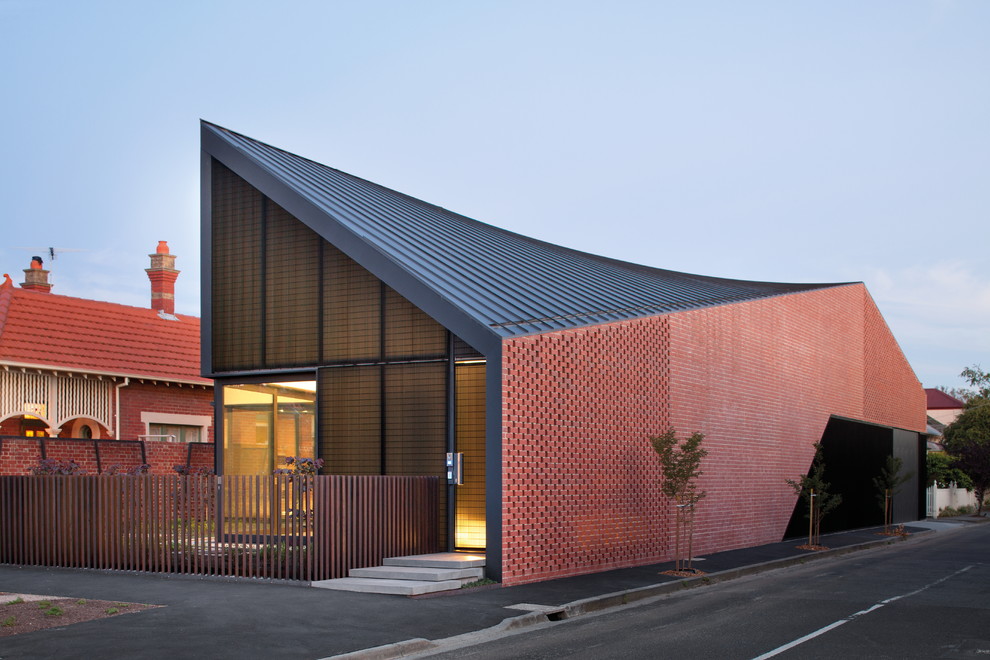 Photo of a large contemporary one-storey brick exterior in Sydney.