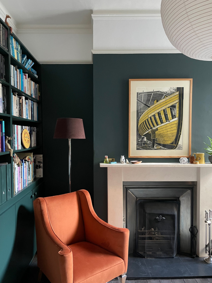 Inspiration for a medium sized eclectic grey and teal enclosed living room curtain in London with a reading nook, beige walls, light hardwood flooring, a standard fireplace, a stone fireplace surround, a freestanding tv, yellow floors, a wallpapered ceiling and wallpapered walls.