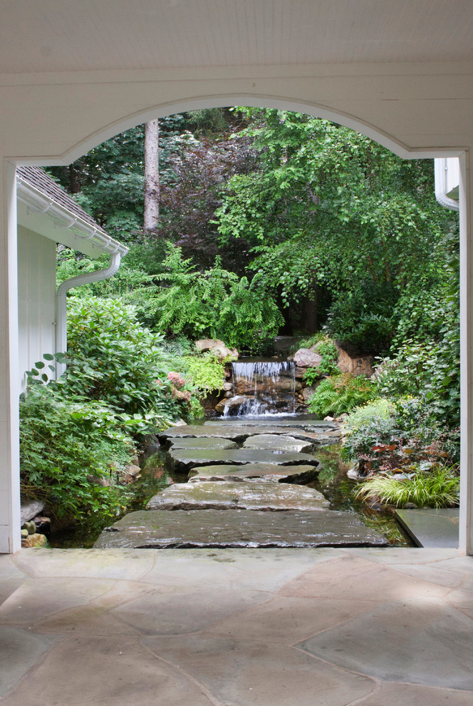 Photo of a traditional garden in Philadelphia with a water feature.
