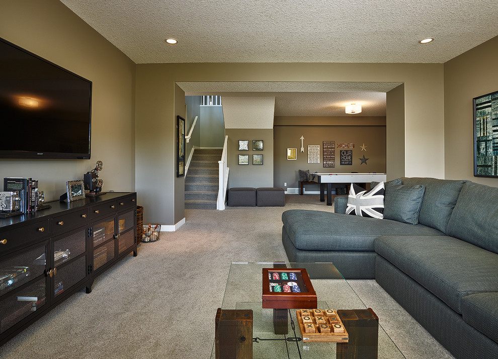 Inspiration for a mid-sized transitional walk-out carpeted basement remodel in Calgary with brown walls and no fireplace