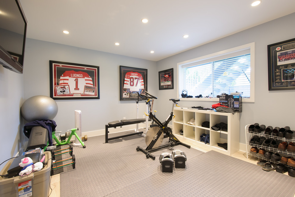 Inspiration for a traditional home weight room in Vancouver with grey walls.