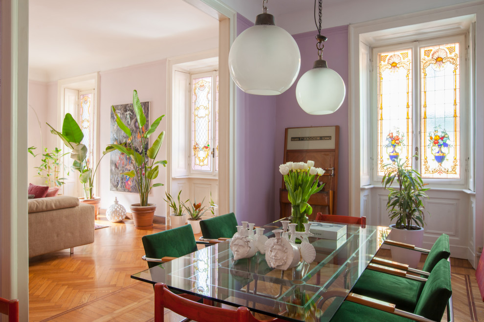 This is an example of an eclectic dining room in Milan.