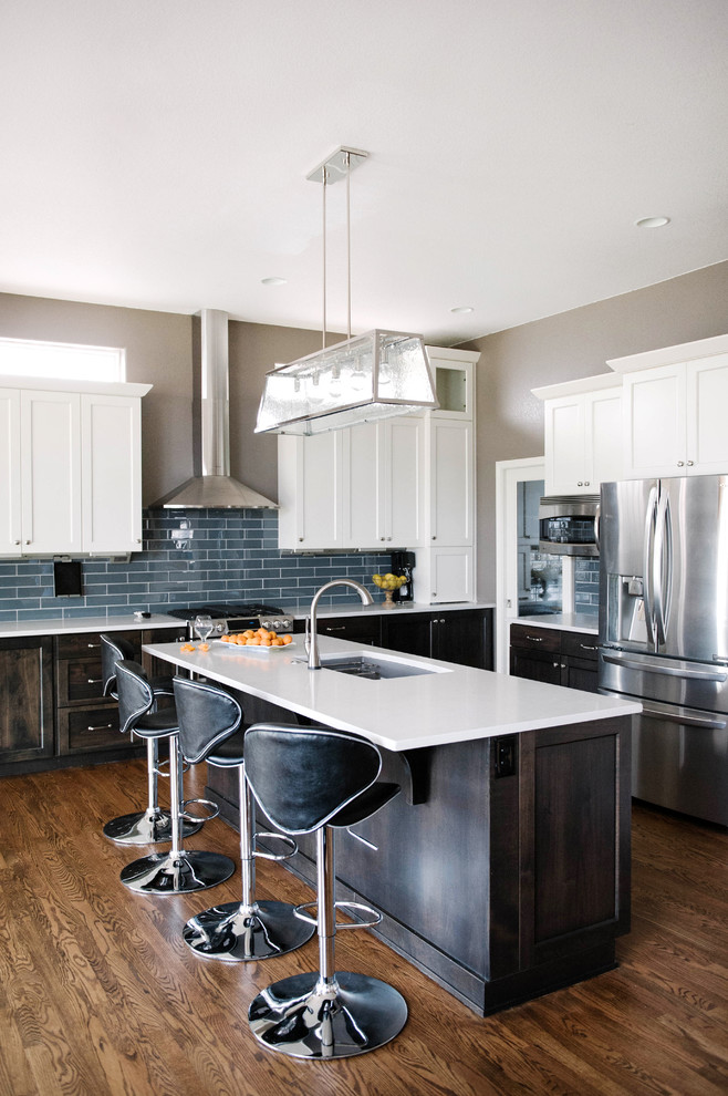 Example of a transitional kitchen design in Denver