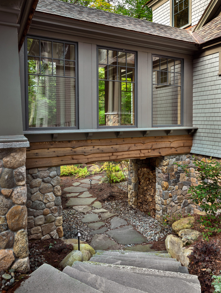 Inspiration for a transitional partial sun stone garden path in Other.