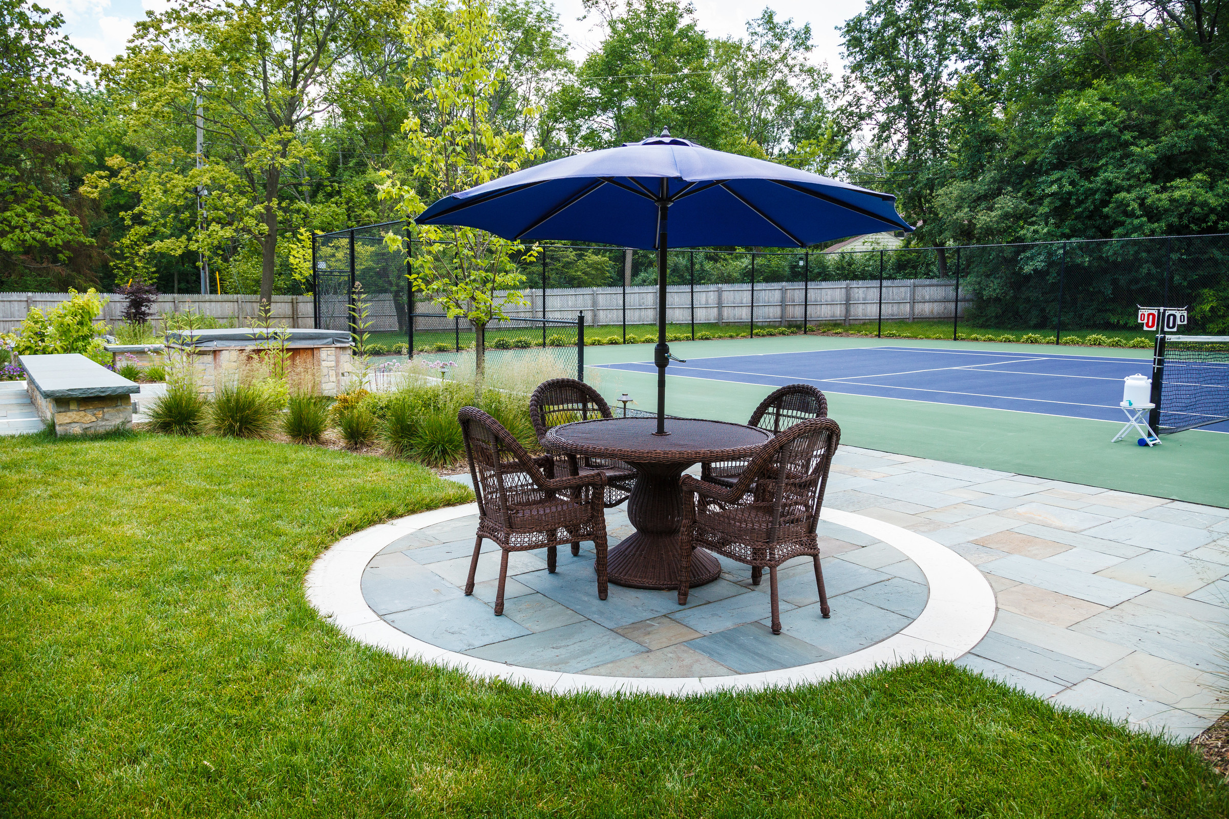 Traditional Tennis Court and Patio - Fox Point