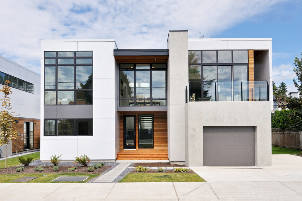 Inspiration for a modern concrete exterior in Vancouver.