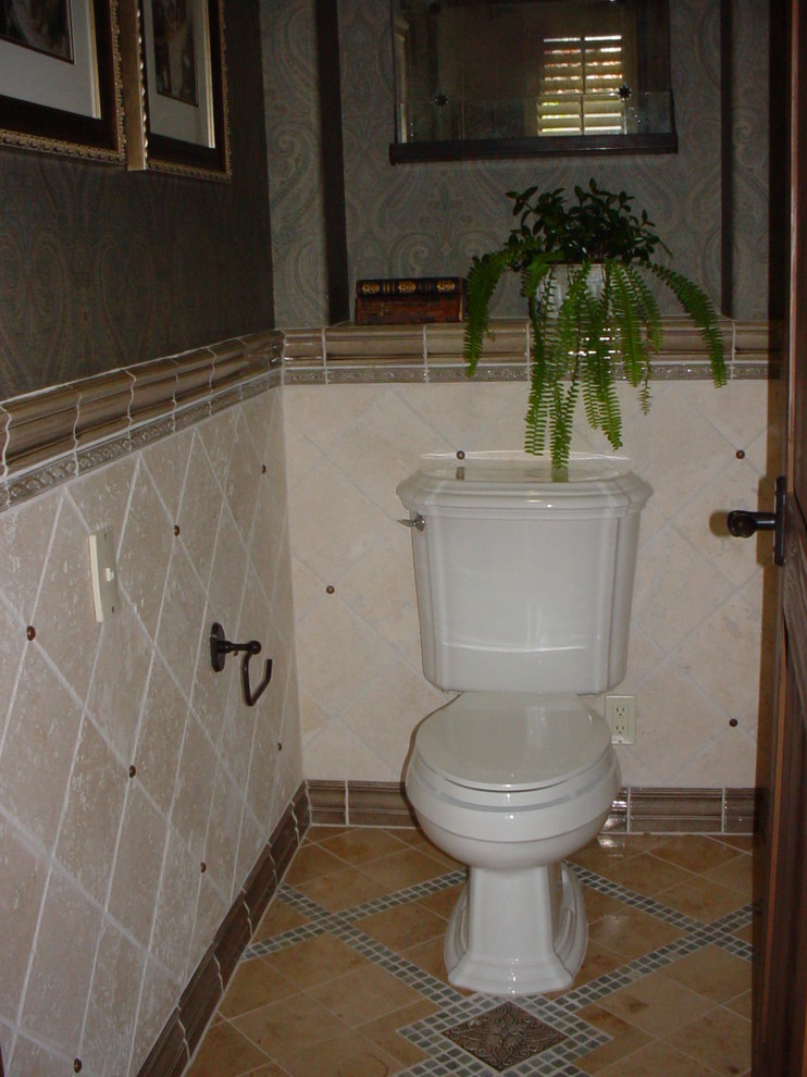 Design ideas for a traditional powder room in San Diego.