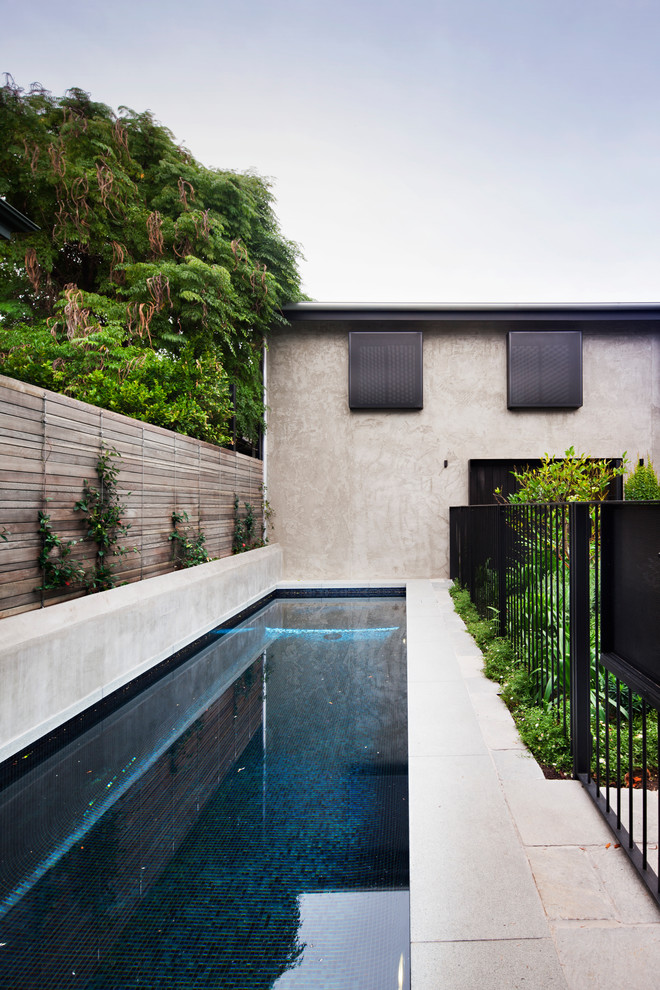 Photo of a contemporary rectangular lap pool in Melbourne.
