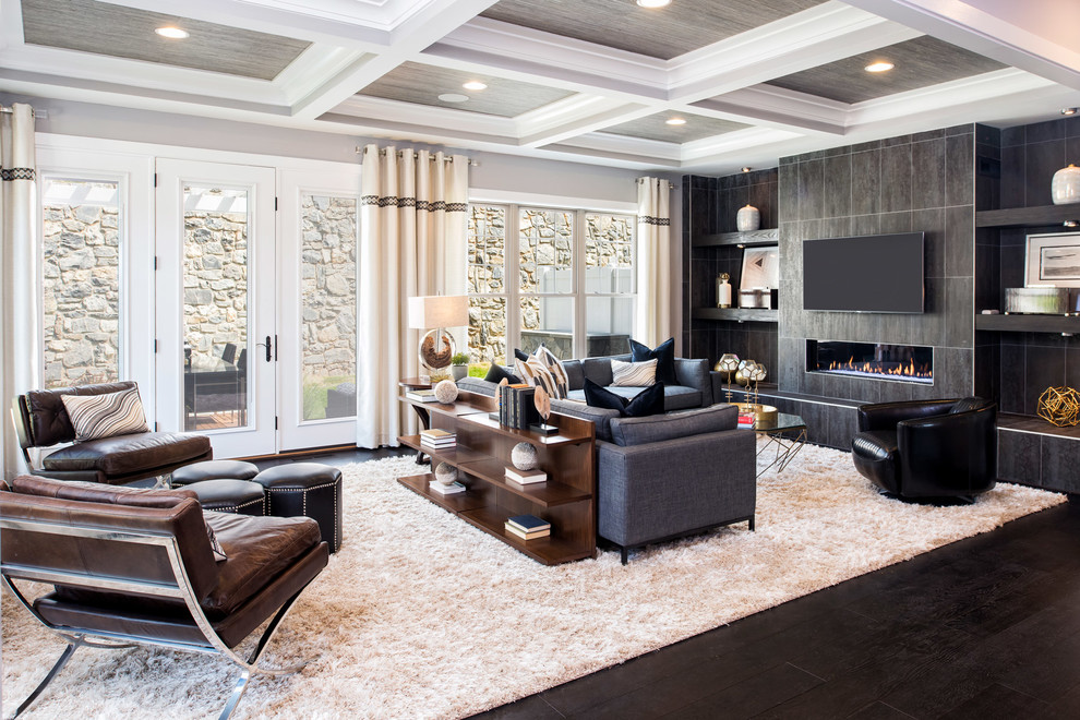 Transitional open concept living room in DC Metro with grey walls, dark hardwood floors, a ribbon fireplace, a stone fireplace surround and a wall-mounted tv.