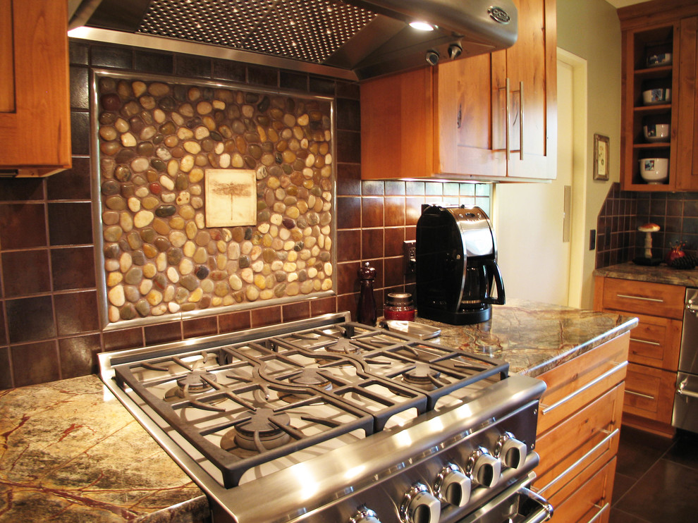 Eat-in kitchen - large transitional u-shaped eat-in kitchen idea in New Orleans with a double-bowl sink, medium tone wood cabinets, marble countertops, brown backsplash, ceramic backsplash, stainless steel appliances and no island
