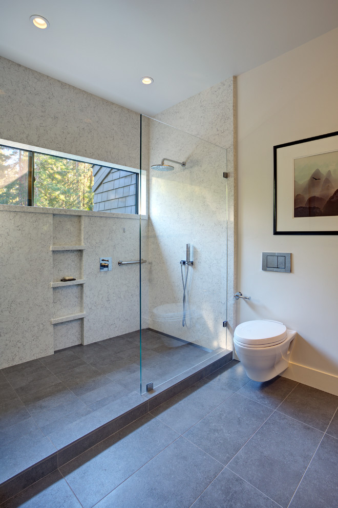 Inspiration for a mid-sized contemporary master bathroom in San Francisco with an undermount sink, open cabinets, white cabinets, engineered quartz benchtops, an alcove tub, a shower/bathtub combo, a wall-mount toilet, glass tile, porcelain floors, gray tile, white walls, brown floor and an open shower.