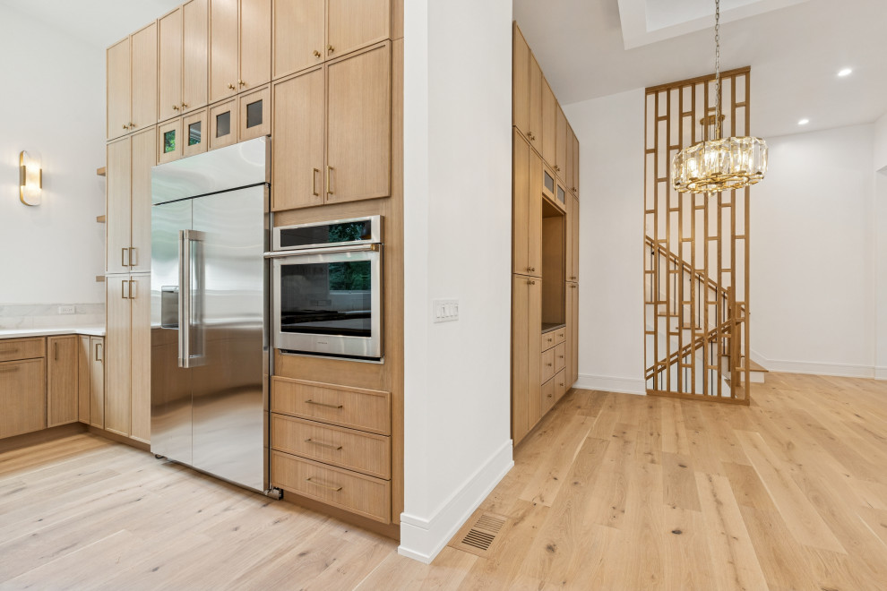 Elevated Kitchen Wall with Hidden Storage & Sculptural Divider