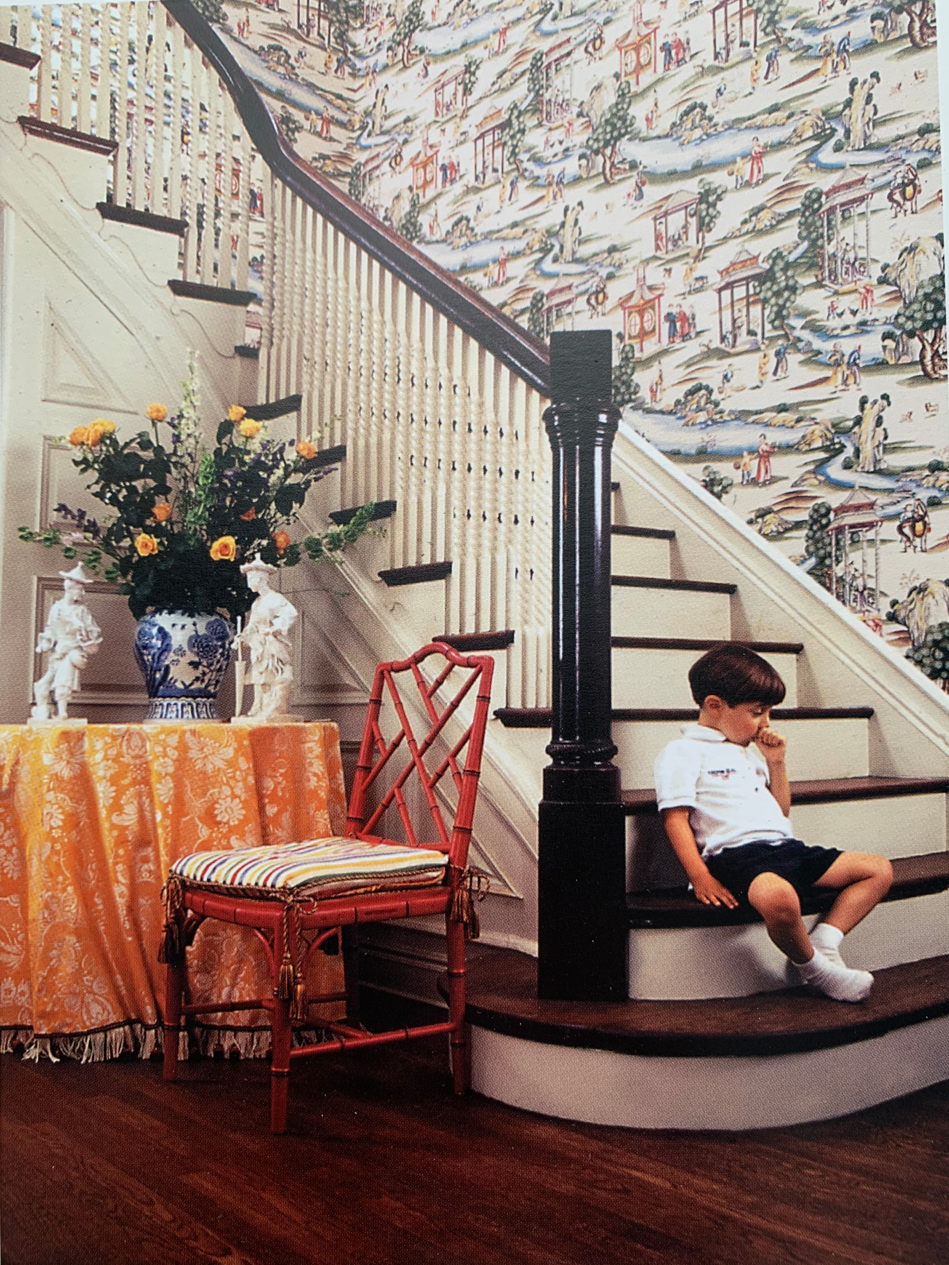 Wallpaper an open stairwell to balance the large open space!