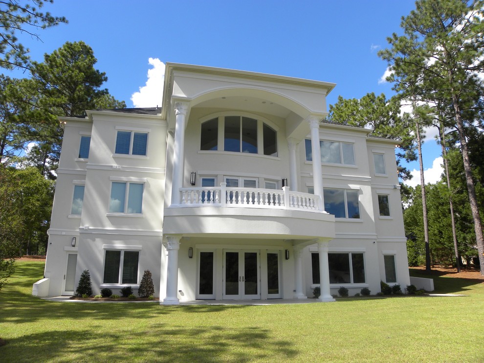 Design ideas for an expansive traditional exterior in Raleigh.