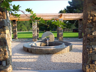 GARDEN: meditation garden with reclaimed olive press fountain