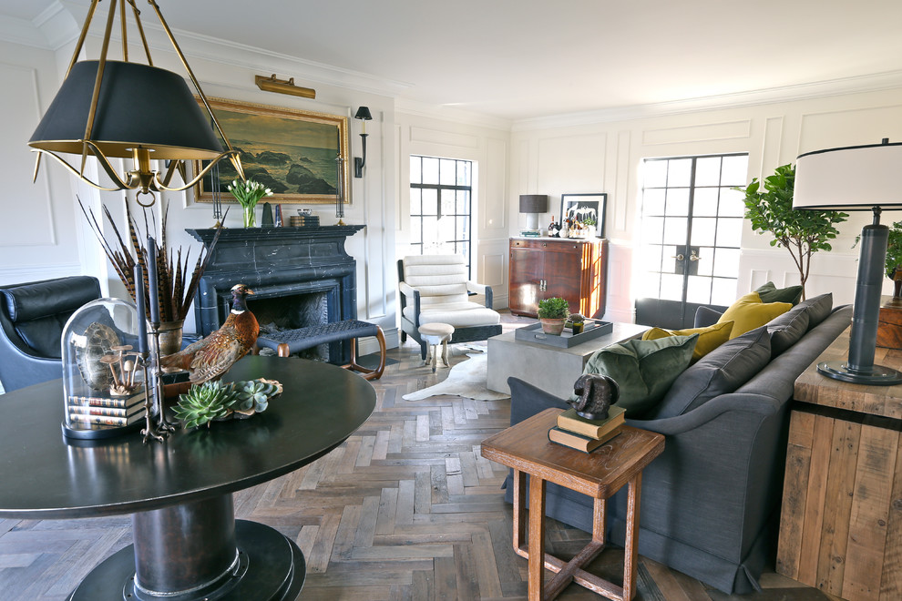 Inspiration for a traditional living room in Chicago with dark hardwood floors and a standard fireplace.
